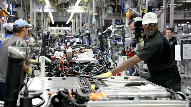 Two people working on the Chattanooga assembly line.