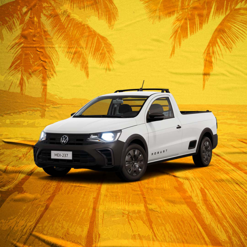 Camioneta pick up Saveiro Robust en color blanco, con plantas en batea. 