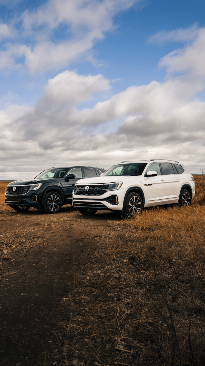 The Atlas Cross  parked outdoors with woods in the background