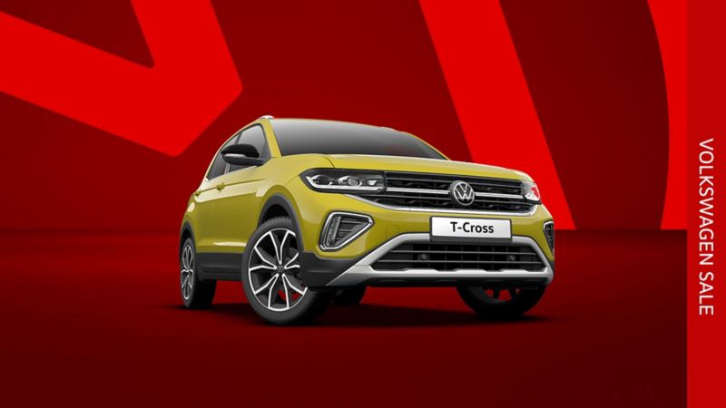 A yellow T-Cross front view from low angle on a red background