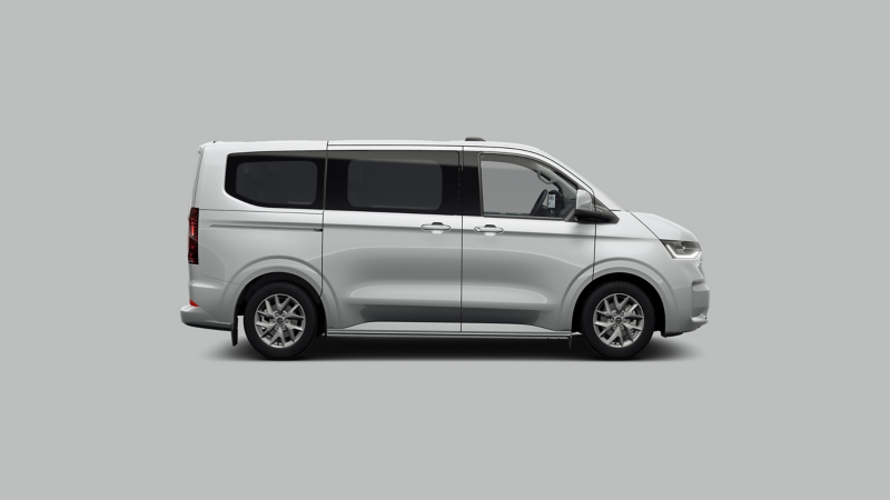 A VW Transporter Shuttle against a plain grey background. 