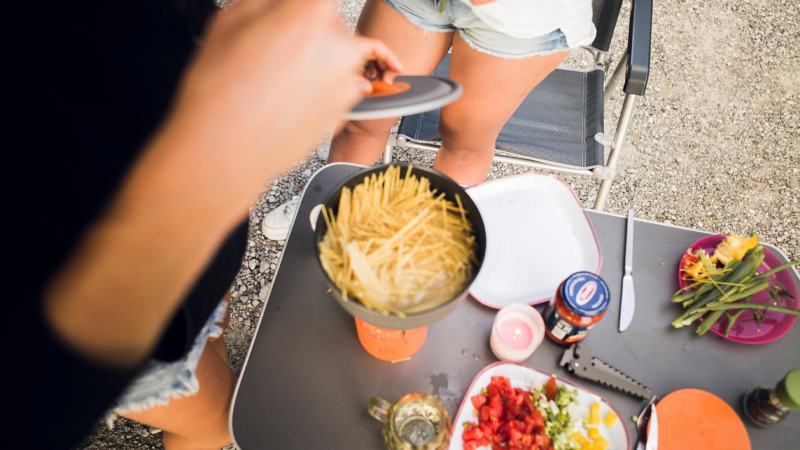 Cooking pasta on a gas cooker.