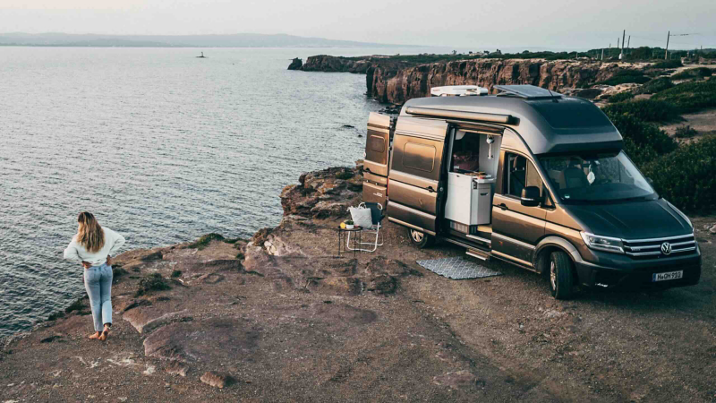 VW Grand California on a cliff.