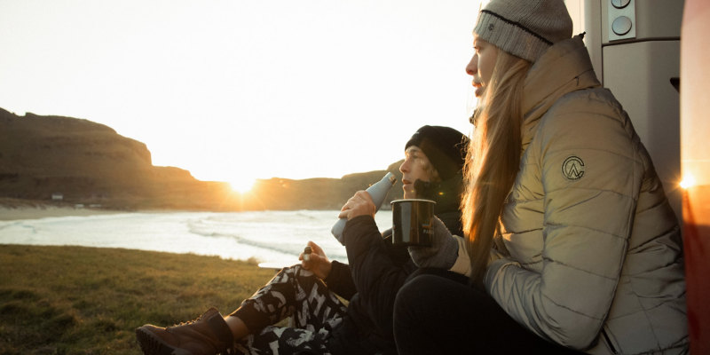 Drinking coffee in front of a California.