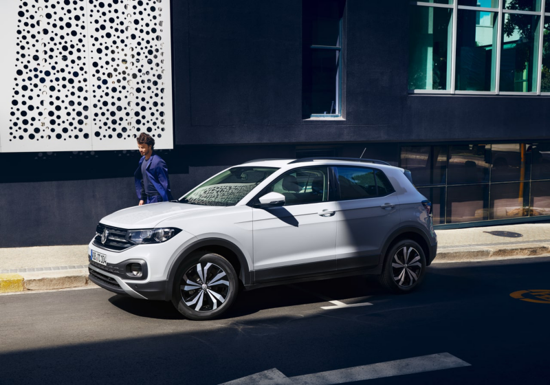 White T-Cross parked on a road