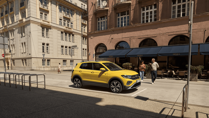 Woman gets off a VW T-Cross