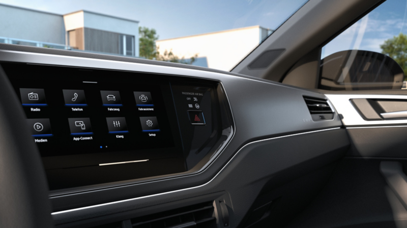 Beifahrerseite eines VW Taigo ENERGY mit Ambientebeleuchtung im Innenraum.