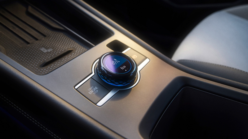 Detailed view of the driving mode control switch in the centre console of the VW T-Roc Style.