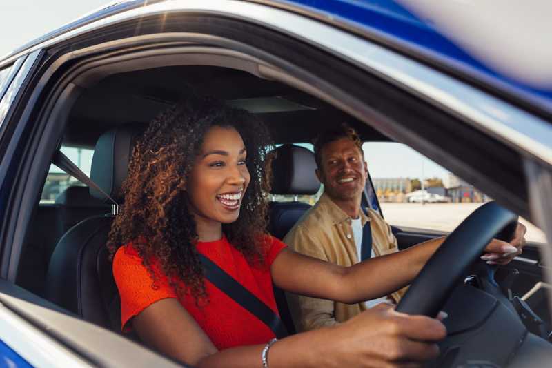 woman driving a Tiguan R