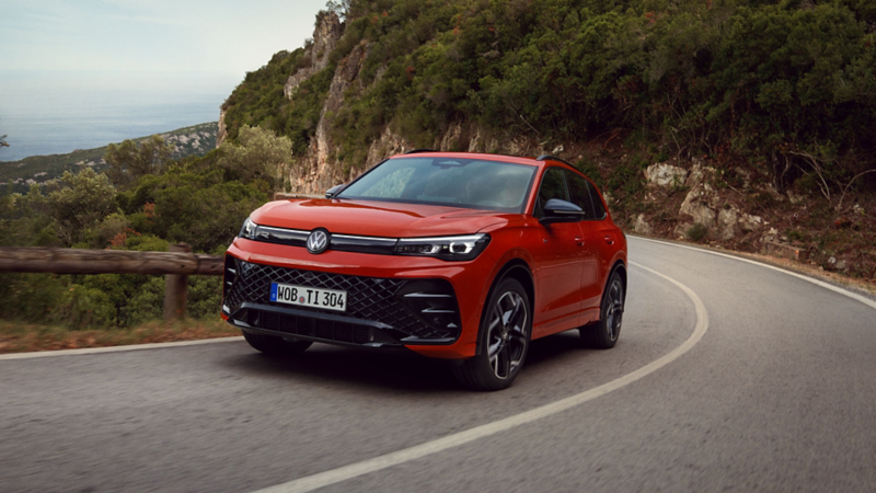 Range-bild med tre olika Volkswagenbilar
