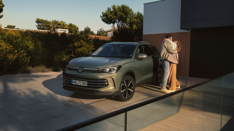 VW Tiguan parked in green