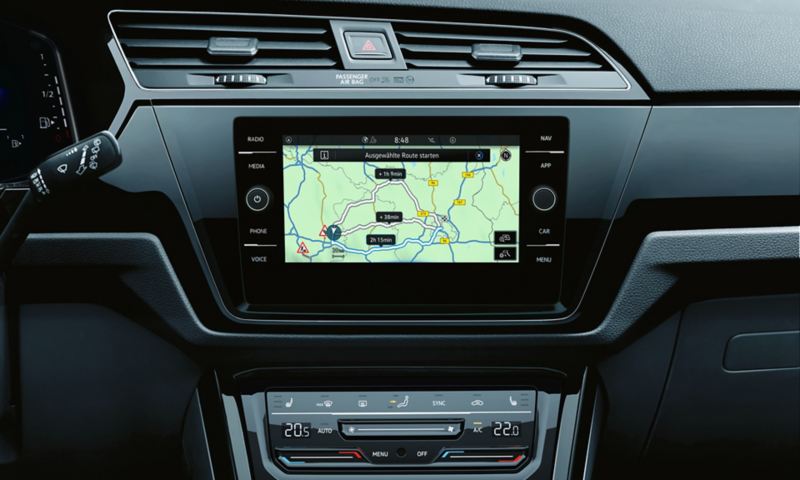 Navigation system in the VW Touran shows intelligent navigation system with traffic information in real time with optional We Connect Plus.