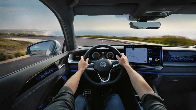 Interior view of the Tayron from the driver's perspective demonstrating the head up display