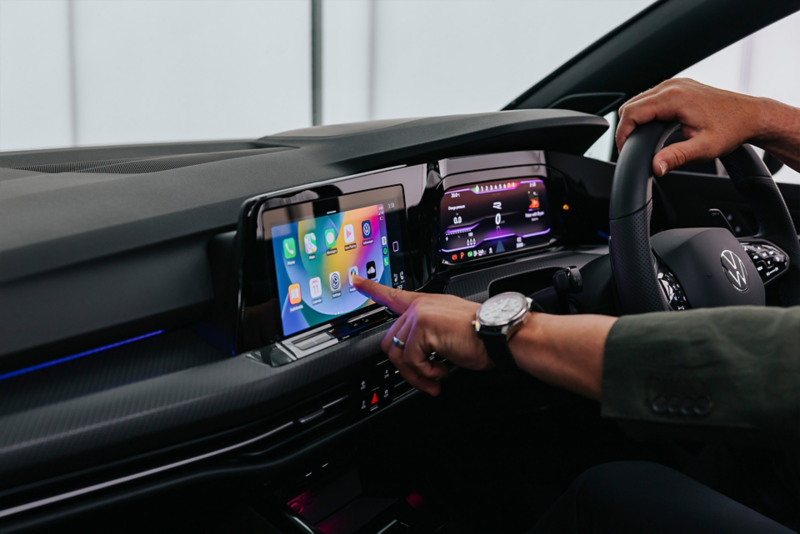 Customer interacting with Volkswagen Carplay