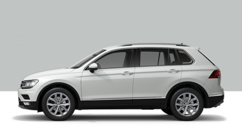 Side view of a VW Tiguan Allspace on a grey background