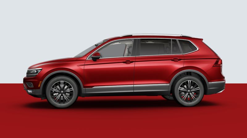 Side view of a volkswagen Tiguan in a studio background