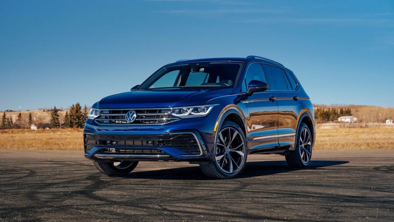 Front view of the 2024 Tiguan parked on a gravel road