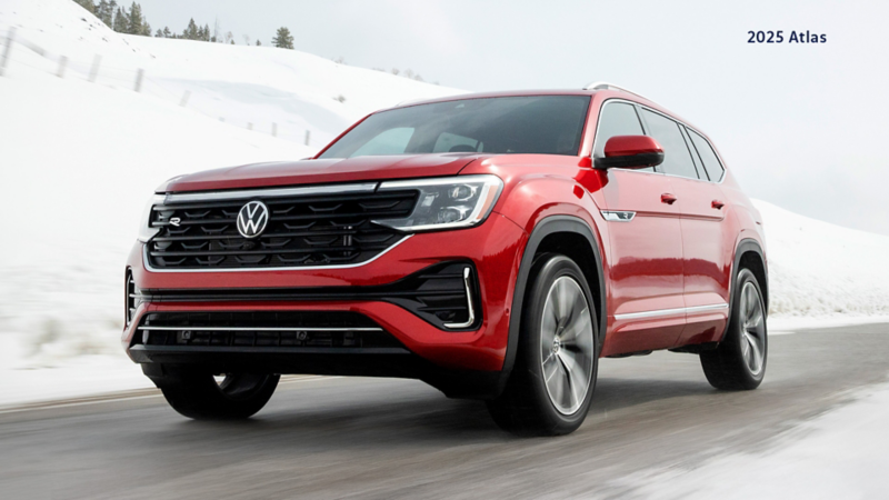 An Aurora Red Chroma VW Atlas Execline on a wintery road.