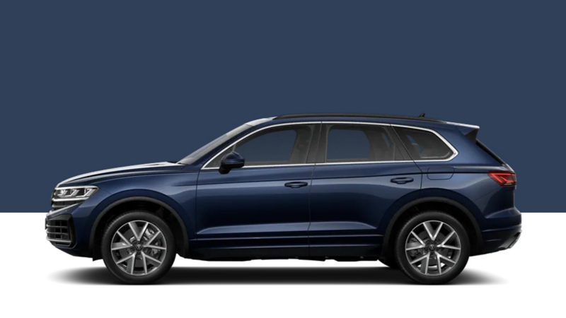 Side view of a VW Touareg on a dark blue background