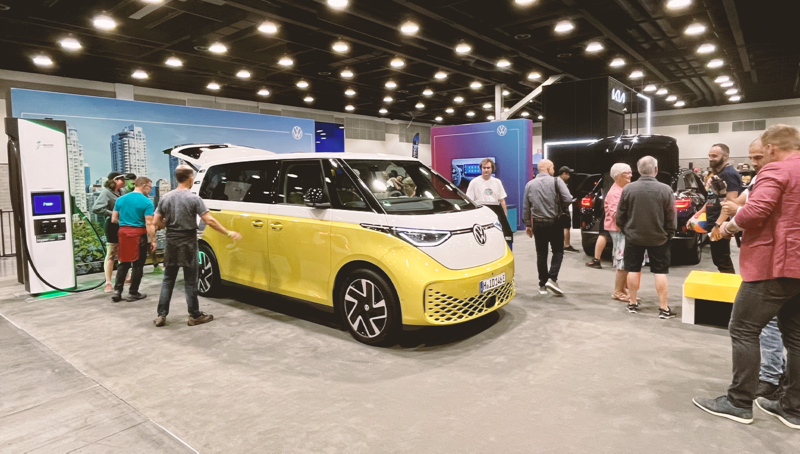 A group of Fully Charged attendees getting an upclose look at the Volkswagen ID. Buzz