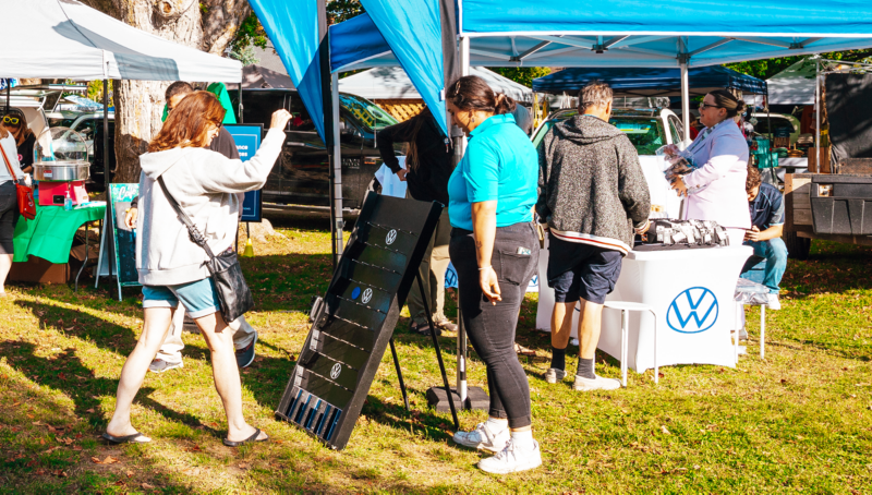 A festival attendee playing Plinko