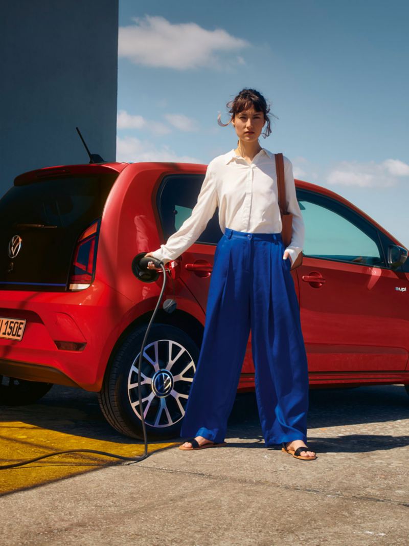 VW e-up!, woman in the front