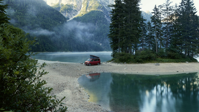 Photo of a parked California by a lake