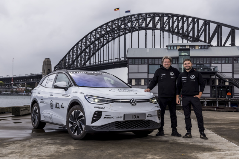Volkswagen ID.4 by Sydney harbour bridge with two drivers