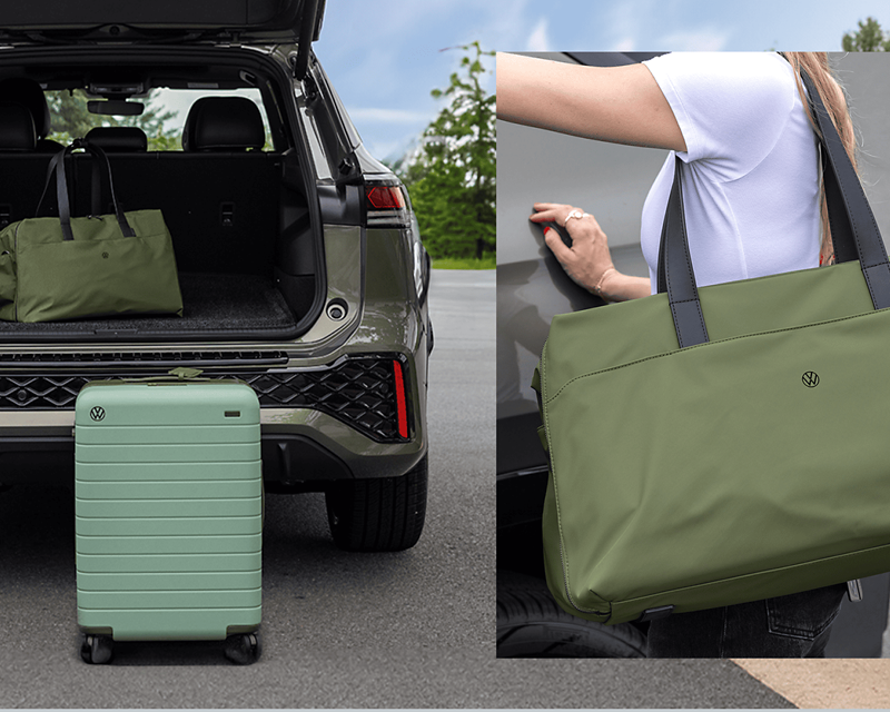 uggage and tote bag next to an SUV, showcasing travel essentials in an outdoor setting.