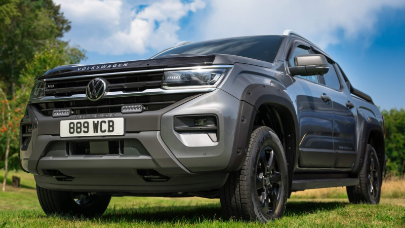 Photo of a VW Amarok parked at a countryside location. 