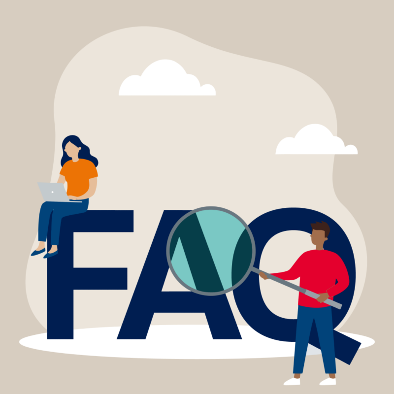 Two people in front of a FAQ sign