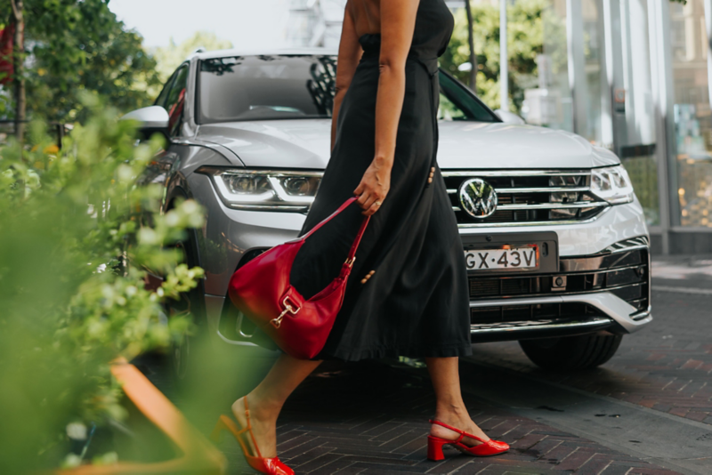 Woman in front on the Volkswagen Tiguan