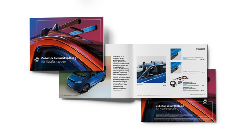 Une brochure dépliée présente le "Zubehör Gesamtkatalog für Nutzfahrzeuge" de Volkswagen, montrant divers accessoires pour véhicules utilitaires, notamment des barres de toit et un porte-vélos.