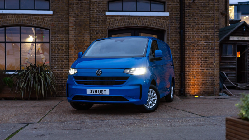 Exterior photo showing the new e-Transporter plugged in at a wallbox charger.