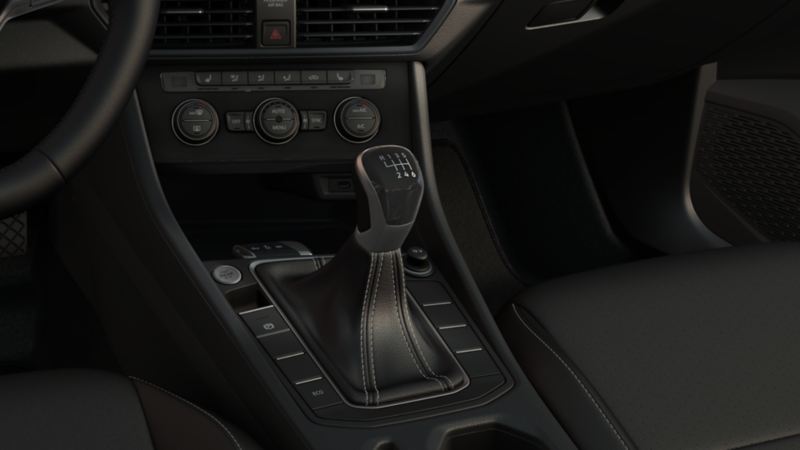 Interior view of a 2023 Volkswagen Jetta showcasing the center console with an automatic transmission gear shift lever.