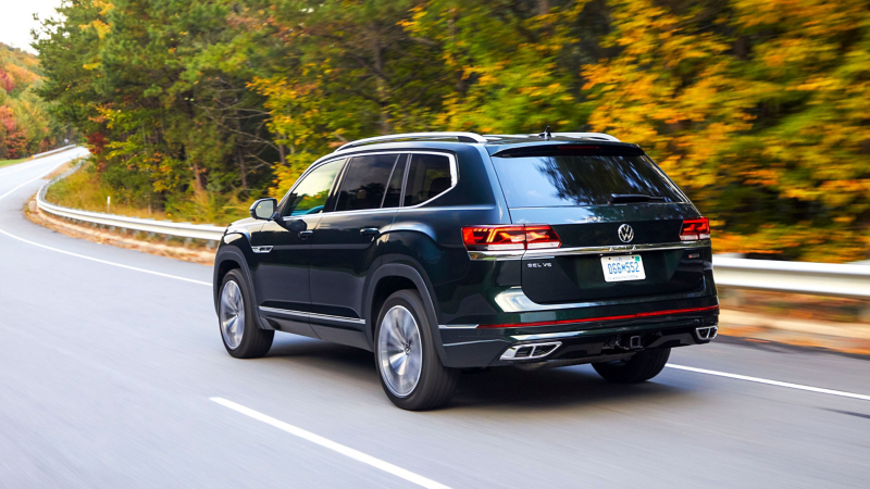 The 2022 Volkswagen Atlas driving down a roadway. 