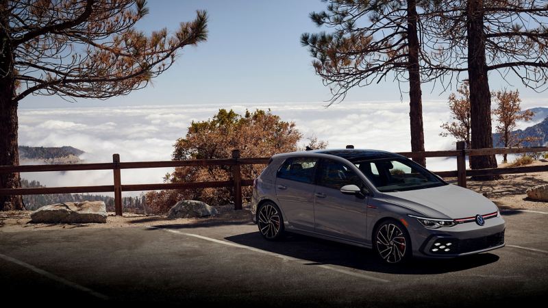The 2022 Volkswagen Golf GTI parked at an overlook.