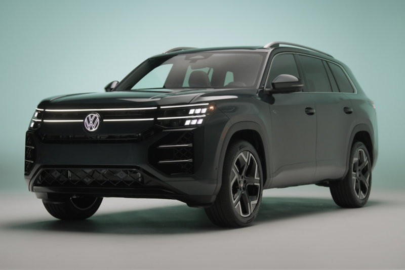 Front view of an Atlas shown in Sacramento Green Metallic parked in a studio setting.