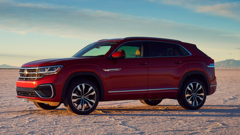 2023 VW Atlas Cross Sport in Aurora Red Metallic, shown in profile view.