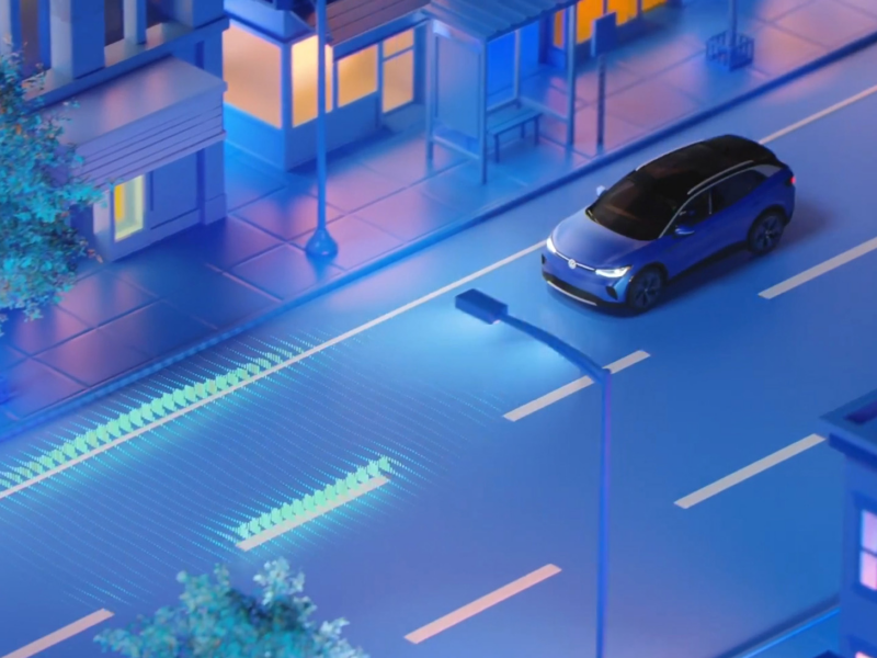 Illustration of a VW driving down a city street with graphic representations of sensors scanning the road ahed of the vehicle.