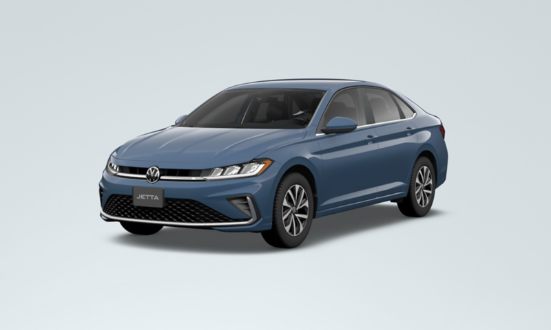 A Jetta shown in Monterey Blue Pearl is parked on a white background.