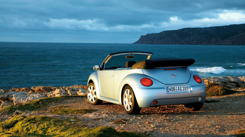 The 2003 Volkswagen New Beetle Convertible parked at an overlook.