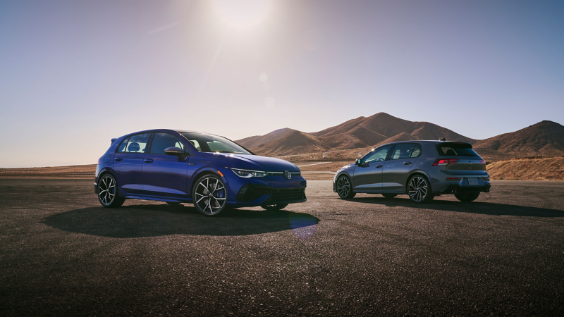 The 2022 Volkswagen Golf R sits on the left of the 2022 Volkswagen Golf GTI.