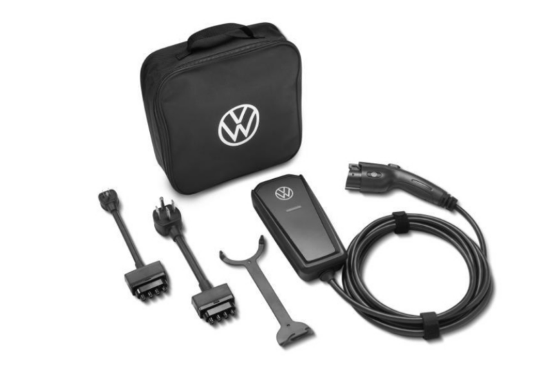 Portable Volkswagen EV charger with interchangeable plug adapters.