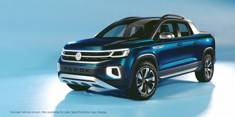 Product shot of Volkswagen Tarok concept in a studio, front 3/4 view. 