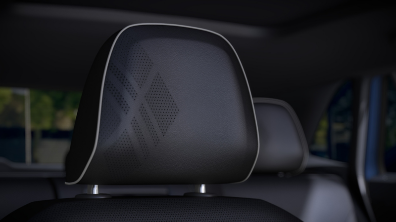 Close up view of the front passenger head restraint in an Atlas Cross Sport showing perforated design detail.