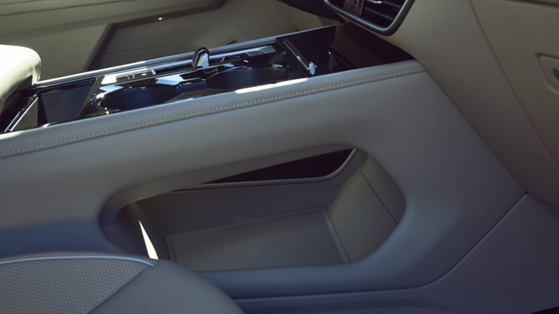Interior view of an Atlas showing the storage cubby beneath the center console.