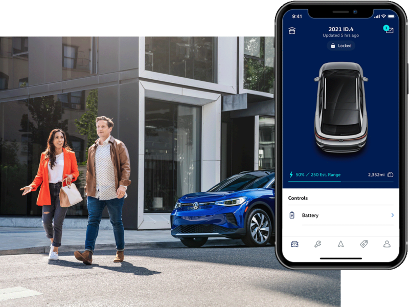 Street level shot of a man and woman talking next to a parked ID.4 in Dusk Blue Metallic. The MyVW app is displayed on a superimposed mobile phone.