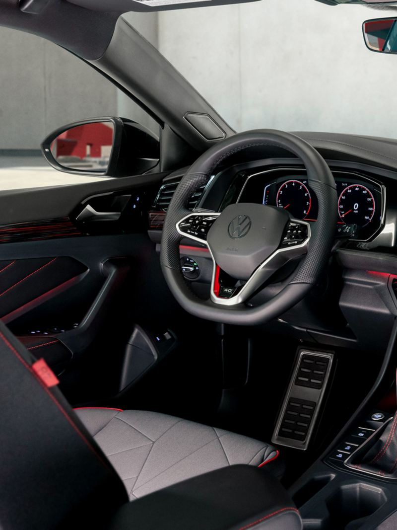 Interior view of the Jetta GLI as shown in molecular cloth showing the driver area as seen from the second row behind the front passenger seat.