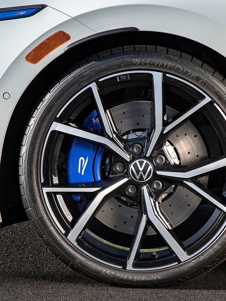 Close up view of Golf R 19” wheel and front brake caliper.